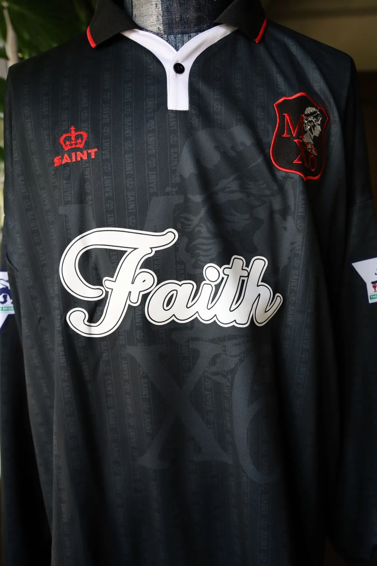 SAINT M×××××× SOCCER SHIRT 'FAITH'/BLK FAITH Football Long Sleeve Black S-XL This design has a lot of craftsmanship Digital fabric printing/front positioning printing laser cutting Offset printing + flocking printing + embossing Imported Behringer machine embroidery Flat machine collar + cuffs Genuine consistent main mark/wash mark/cherub mark